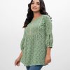 Green A-line Tunic in printed Georgette fabric. Features a round neck with hook closure at the front and lantern sleeves. Embellished with embroidery at the front. Unlined.