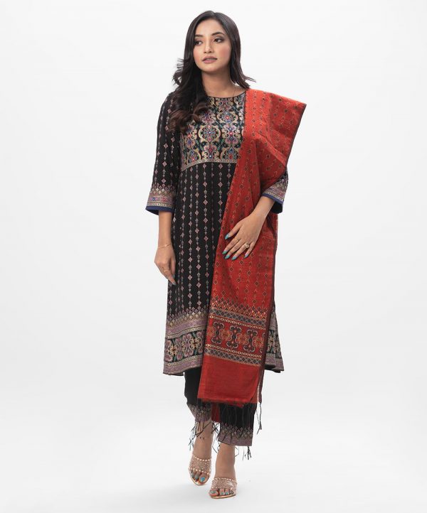 Black all-over printed Salwar Kameez in Viscose fabric. The Kameez is designed with a round neck and three-quarter sleeves. Embellished with karchupi at the top front. Complemented by culottes pants with print on the border lines and a half-silk dupatta.