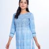 Sky blue all-over printed straight-cut Kameez in Viscose fabric. Designed with a boat neck and three-quarter sleeves. Embellished with embroidery at the top front and lace attachment at the cuffs.
