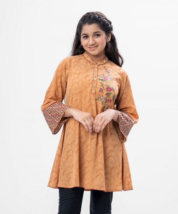 Brown all-over printed A-line Tunic in Georgette fabric. Features a band neck with hook closure at the front and wide sleeves. Embellished with embroidery at the top front.