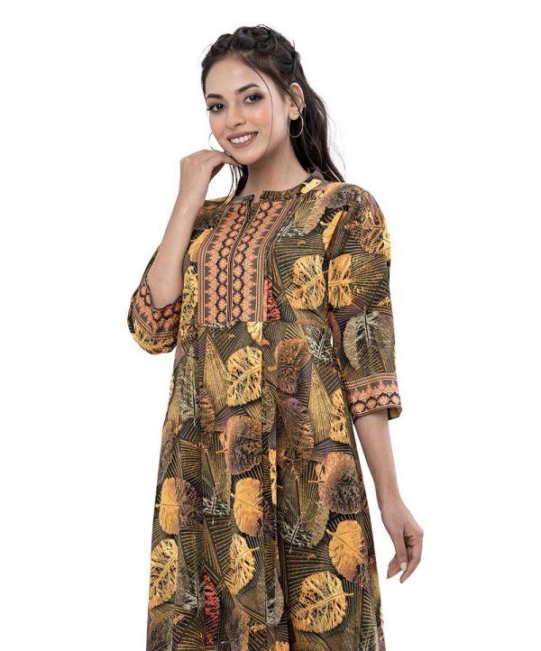 Multi-color A-line Tunic in printed Georgette fabric. Feature a band neck with hook closure at the front and three-quarter sleeves. Pin tucks and patch attachment at the top front. Pleats from the waistline. Unlined.