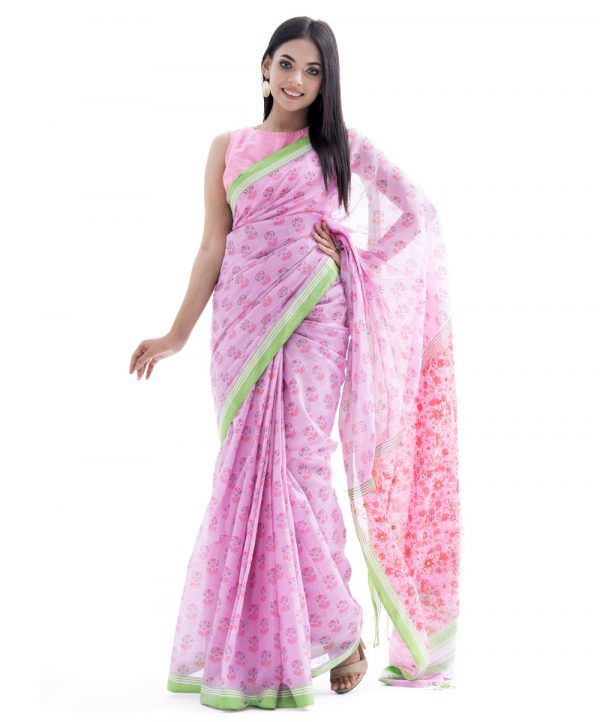 Pink all-over printed Cotton Saree with contrast green border. Embellished with embroidery on the achal.