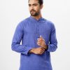 Blue fitted Panjabi in Jacquard Cotton fabric. Designed with a mandarin collar and matching metal buttons on the placket. Embellished with karchupi at the top front.
