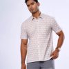 White all-over printed comfort shirt in Slab Cotton fabric. Designed with a classic collar, short sleeves and chest pocket.