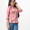 Pink all-over printed A-line Woven Top in Crepe fabric. Designed with a frilled round neck and three-quarter sleeves. Frills detailing at the front and cuffs. Button opening at the back.