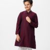 Maroon Panjabi in jacquard Cotton fabric. Embellished with minimal karchupi on the collar. Matching metal buttons on the placket.