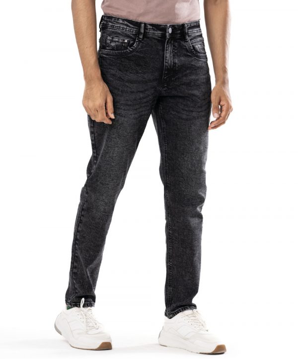 Regular-fit jeans in cotton spandex denim fabric. Five pockets with button fastening at the front & zipper fly.