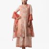 Exclusive gown and shrug-style salwar kameez set from Nargisus by Le Reve. Floral printed muslin shrug with karchupi. Sleevless crepe gown with muslin dupatta.