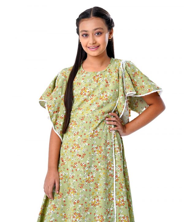Lemon Green wrap style Frock in printed Georgette fabric. Designed with a round neck and overlap flounce sleeves. Detailed with princess cut at the front. Lace attachment at the front and cuffs. Button opening at the back. Viscose lining in half-body.