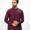 Maroon semi-fitted Panjabi in jacquard Cotton fabric. Embellished with minimal karchupi on the collar. Matching metal buttons on the placket.