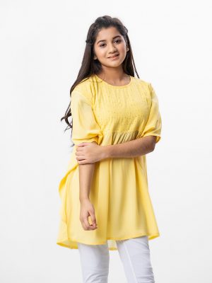 Yellow kaftan style Tunic in Georgette fabric. Designed with a round neck and bat sleeves. Embellished with karchupi at the top front and gathers from the waistline. Single button opening at the back. Viscose lining in half-body.