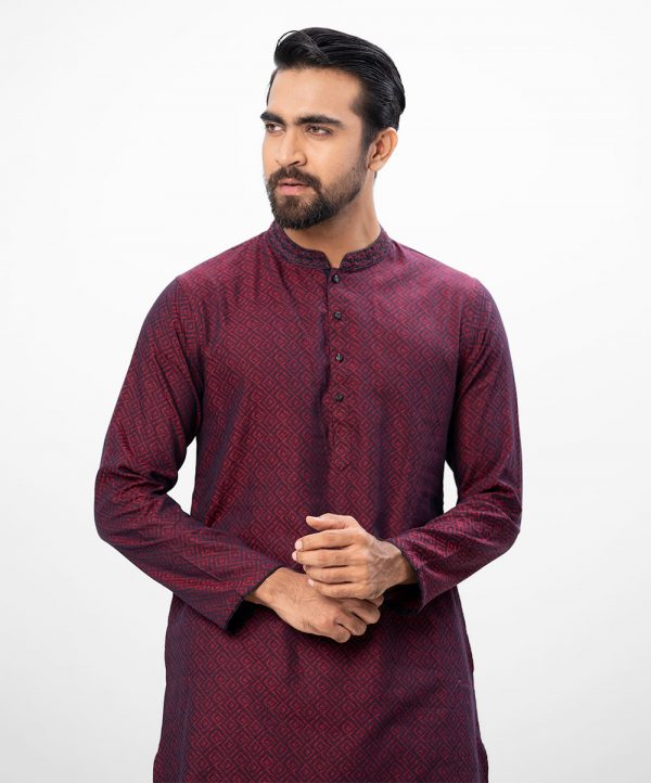 Maroon fitted Panjabi in jacquard Cotton fabric. Embellished with minimal karchupi on the collar. Matching metal buttons on the placket.
