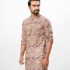 Multi-color fitted Panjabi in printed Cotton fabric. Designed with a mandarin collar and matching metal buttons on the placket.