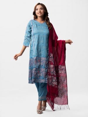 Floral printed straight salwar kameez in crepe fabric. Three quarter sleeved, V-neck and embroidery at front. Half-silk dupatta with pant-style pajamas.
