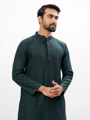 Green semi-fitted Panjabi in Jacquard Cotton fabric. Embellished with embroidery on the collar and placket.