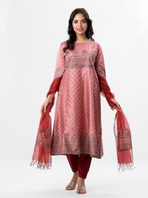Patterned salwar kameez in viscose fabric. Three quater sleeved, round neckline and karchupi with beads. Muslin dupatta with crepe pant-style pajamas.