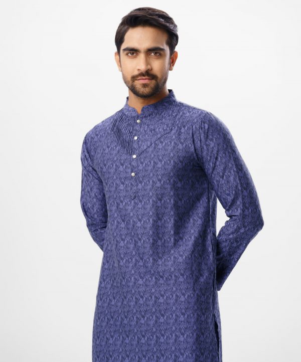Blue semi fitted Panjabi in Jacquard Cotton fabric. Designed with a mandarin collar and matching metal button on the placket. Embellished with pin tucks at the top front.