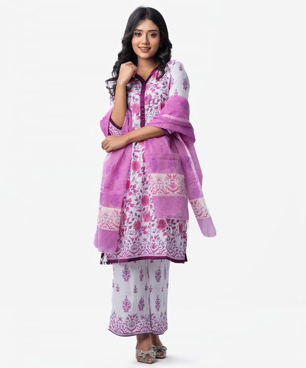 Floral printed straight salwar kameez in viscose fabric. Patch work on neck, placket, sleeves and bottom. Half-silk dupatta with palazzo pants.