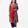 Printed straight salwar kameez in textured georgette fabric. Three quarter sleeved, round neck and karchupi at front. Half-silk dupatta with crepe palazzo pants.
