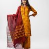 Printed salwar kameez in crepe fabric. Patch work on neck, placket and sleeves. Lace and pleat work at the front and sleeves. Half-silk dupatta with palazzo pants.