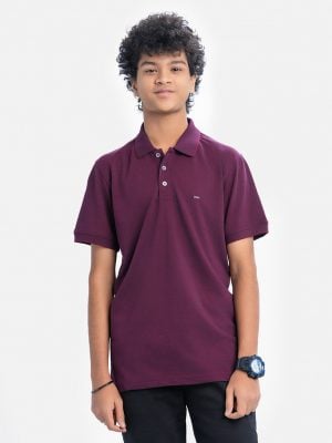Teen boy short-sleeved polo shirt in cotton pique fabric. Rib collar.