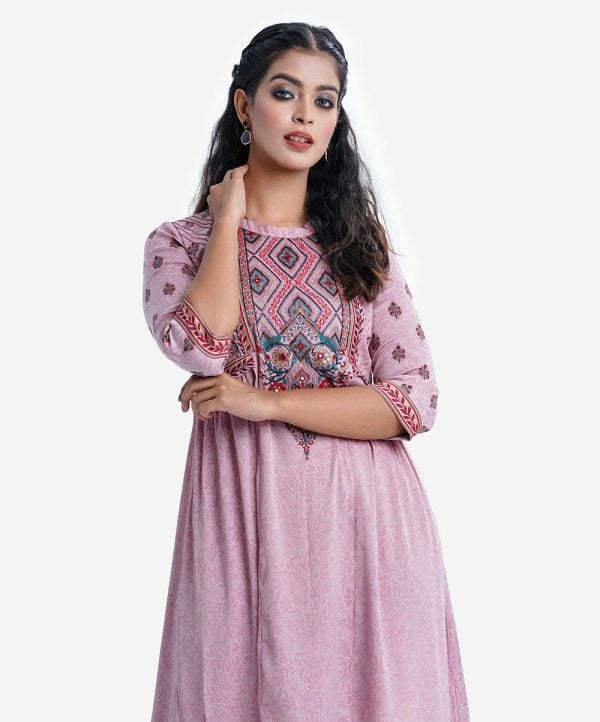 Printed A-line kameez in zoom fabric. Mock neck, three-quarter sleeved. Attach Patch and karchupi at the hemline and sleeve.
