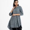 Printed A-line tunic in denim fabric. Stand collar, full sleeved. and two side pockets.