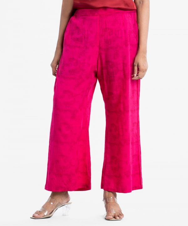 Women's palazzo in viscose fabric. Concealed elasticated waistline.