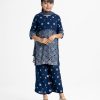 Kid girl's printed straight Salwar Kameez in viscose fabric. Round neck, three-quarter sleeves and karchupi at front. Chiffon dupatta with skirt palazzo pants.