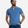 Men's polo shirt in cotton pique fabric. Rib collar and cuff.