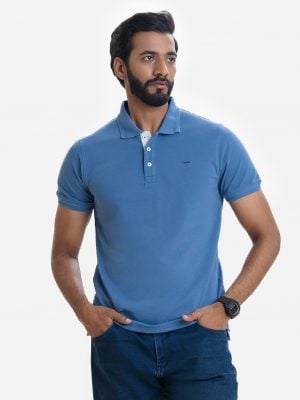 Men's polo shirt in cotton pique fabric. Rib collar and cuff.