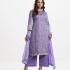 Women's printed straight salwar kameez in crepe fabric. Round neck, three-quarter sleeved. Allover embroidery. Chiffon dupatta with crepe palazzo pant.