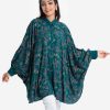 Floral printed butterfly abaya style Tunic in viscose fabric. Classic collar with metal buttons in front opening.