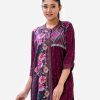 Printed straight kameez in crepe fabric. Band neck, roll up sleeves, high-low hem and embroidery at front.