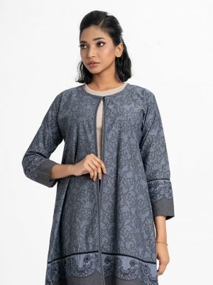 Women's floral printed long shrug in chambray fabric. Single button front opening with round neck, full sleeves.