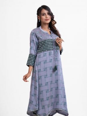 Printed elongated hem kameez in crepe fabric. Band neck with tassel tie placket. Karchupi at front and sleeves.