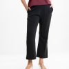 Women's formal pants in stretched Interlock fabric. Front zippers fly and two side pockets.