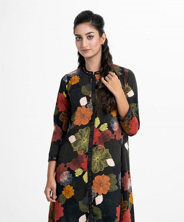 Women's high-low hem abaya style tunic in printed georgette fabric. Karchupi at full sleeves hem and stand collar with metal buttons in front opening.