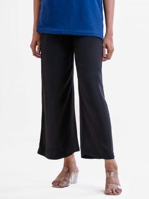 Women's palazzo in viscose fabric. Concealed elasticated waistline.