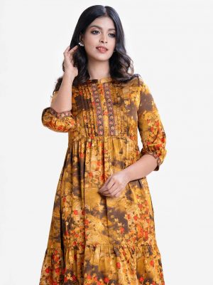 women's A-line long tunic in printed georgette fabric. Stand Collar, Bishob sleeved. Gathered waistline and patch work.