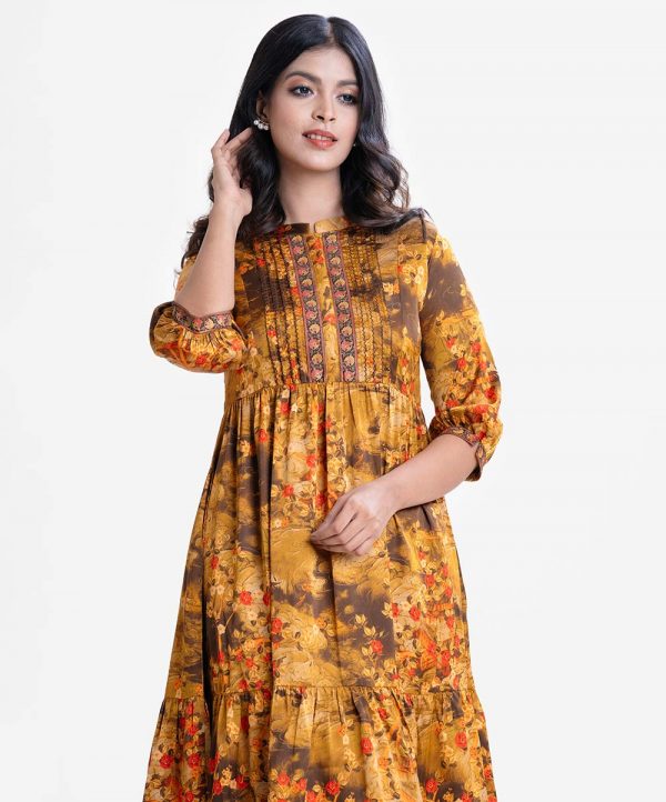 women's A-line long tunic in printed georgette fabric. Stand Collar, Bishob sleeved. Gathered waistline and patch work.