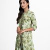 Floral printed frock style kameez in georgette fabric. Stand collar, three-quarter sleeves. Patch with embroidery at front and sleeves.
