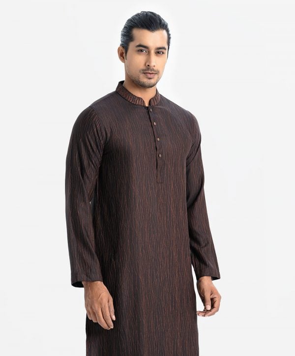Men's semi fitted panjabi in cotton fabric. Mandarin collar with embroidery work and inseam pockets.