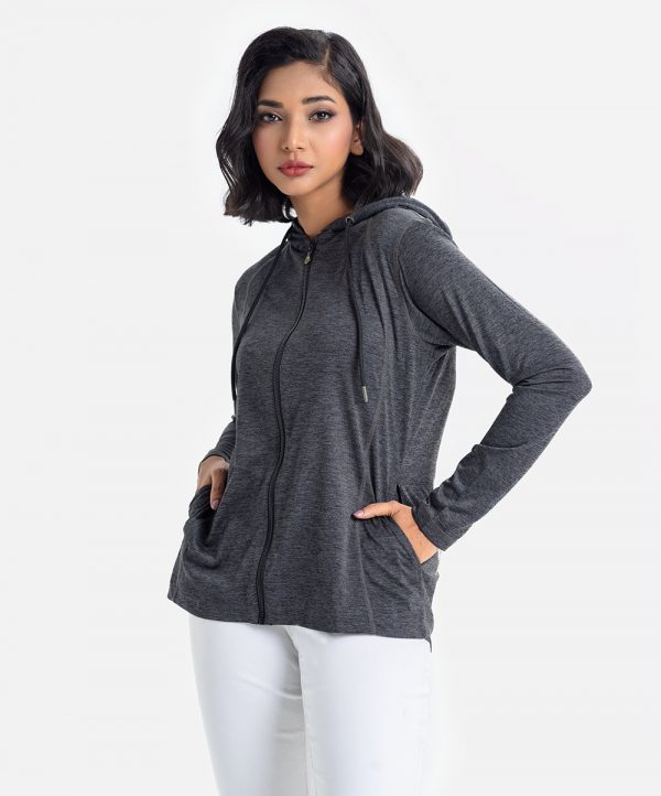 Women's winter Jacket in stitch knit fabric. Full sleeves, drawstring hood, zipper at front, and side pockets.