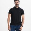 Men's polo shirt in cotton single jersey fabric. Classic collar, short sleeves and a straight-cut hem.