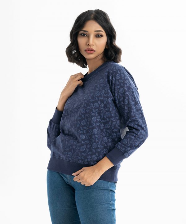 Printed sweat shirt in french terry fabric. Round neck, long-sleeved. Elasticated at the hemline.