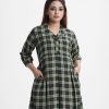 Women's frock style tunic in printed georgette fabric. Shirt collar, three-quarter sleeves. Pleated waistline and patchwork at hemline.