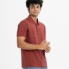 Men's polo shirt in cotton pique fabric. Classic collar, short sleeves and a straight-cut hem.