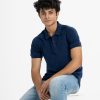 Men's polo shirt in cotton pique fabric. Classic collar, short sleeves and a straight-cut hem.