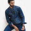 Men's casual slim-fit denim jacket. Stand collar with a throat latch, full sleeves. Front zipper opening with two pockets.